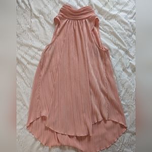 Long coral sleeveless turtleneck blouse